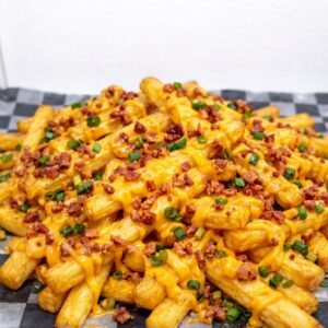 PAPAS BASTON CON CHEDDAR